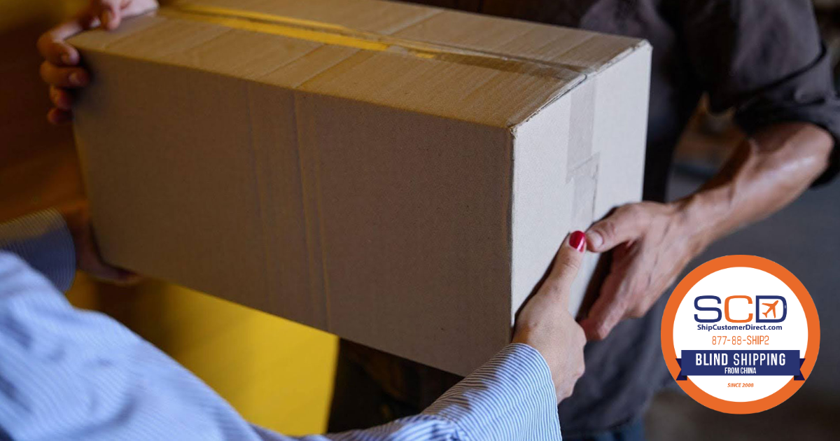 Person hands over an anonymous box for blind shipping from China